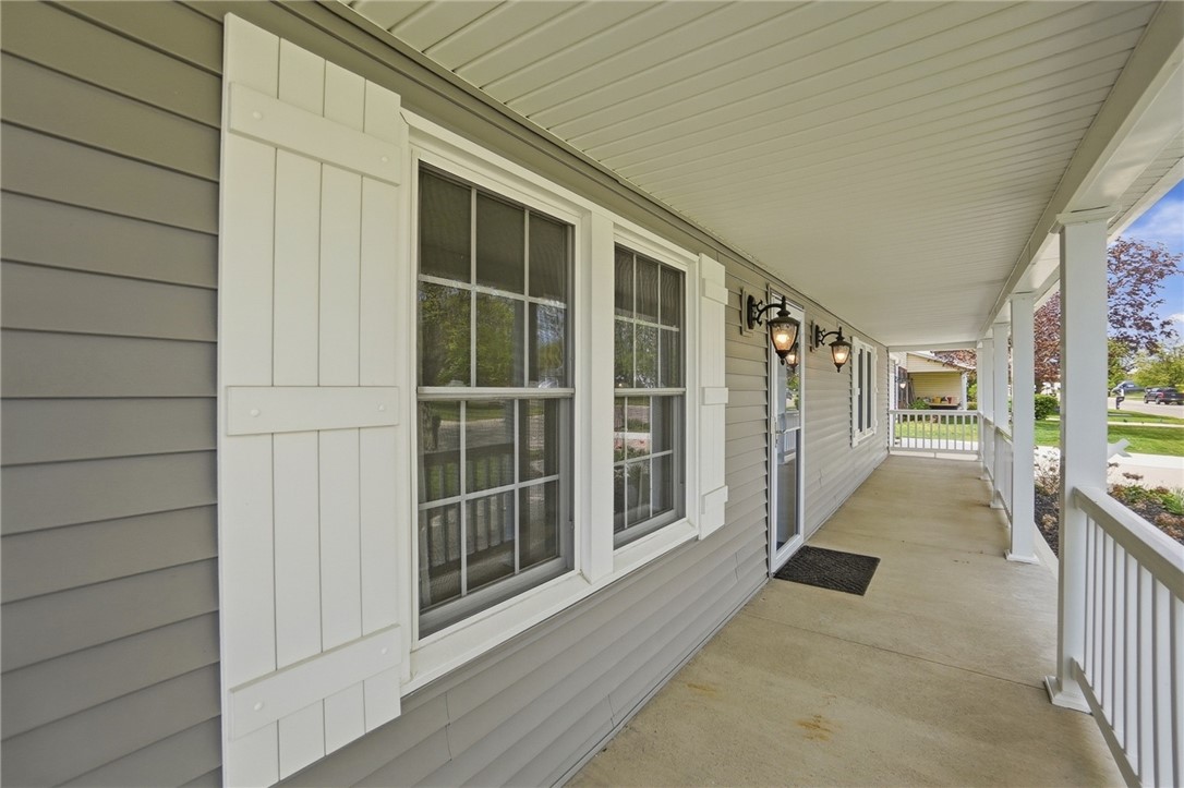 135 Concord Farm Road Englewood, OH 45322 - Photo 6 of 46 This inviting covered porch provides a gracious welcome to all who enter, perfect for relaxation.