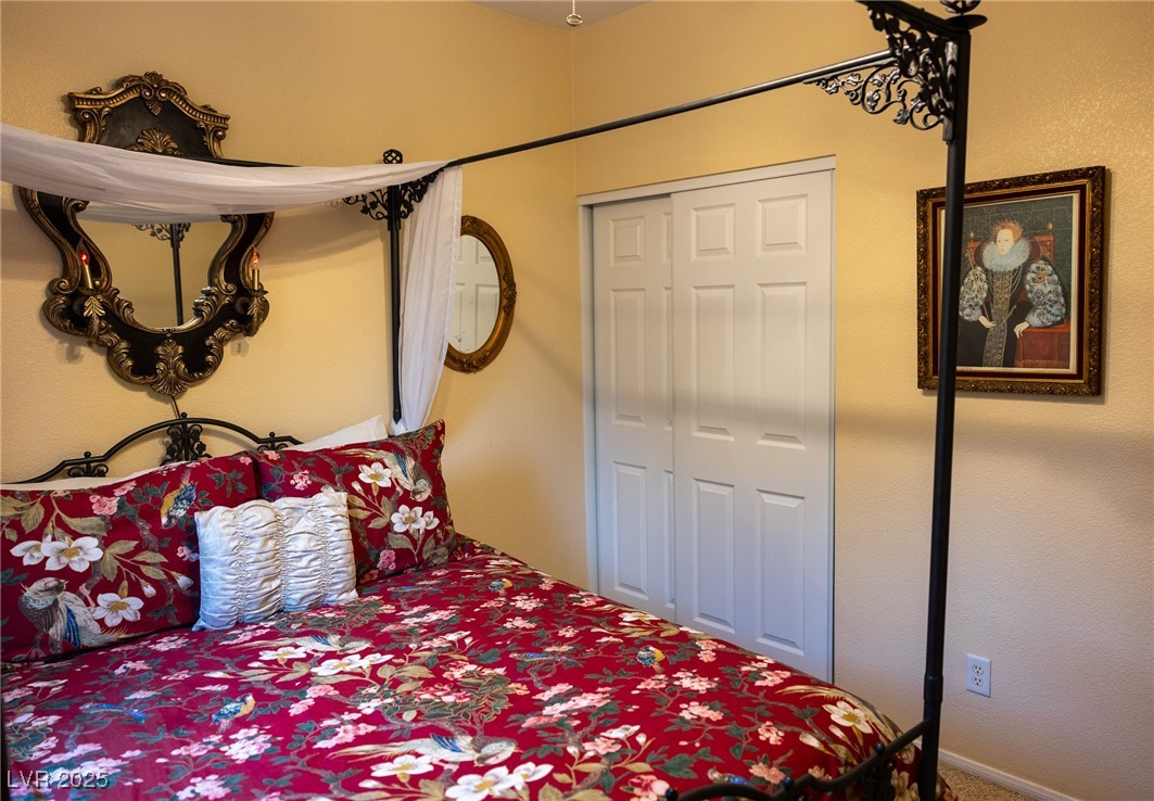 212 Malcolm Street Henderson, NV 89074 - Photo 18 of 47 Bedroom with a closet- Downstairs w 3/4 bath