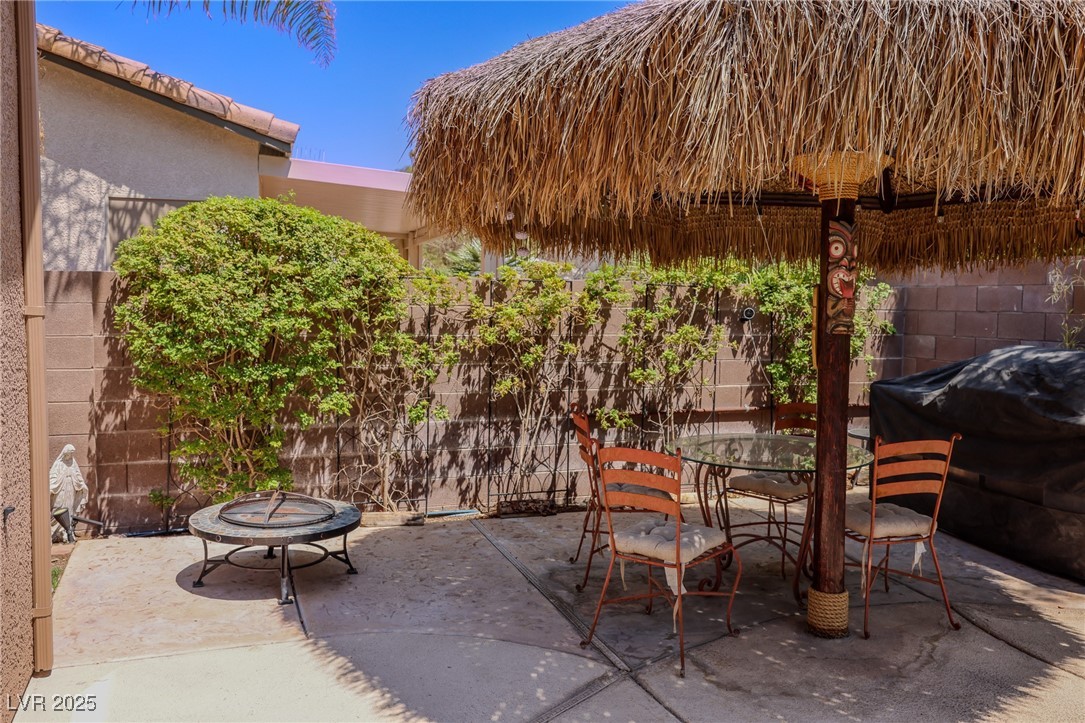 212 Malcolm Street Henderson, NV 89074 - Photo 2 of 47 View of patio featuring a outdoor dining space