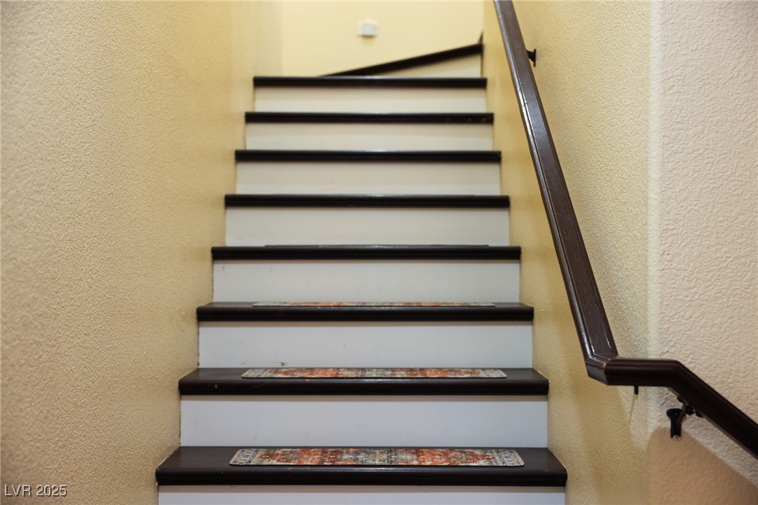 212 Malcolm Street Henderson, NV 89074 - Photo 20 of 47 Stairway featuring a textured wall
