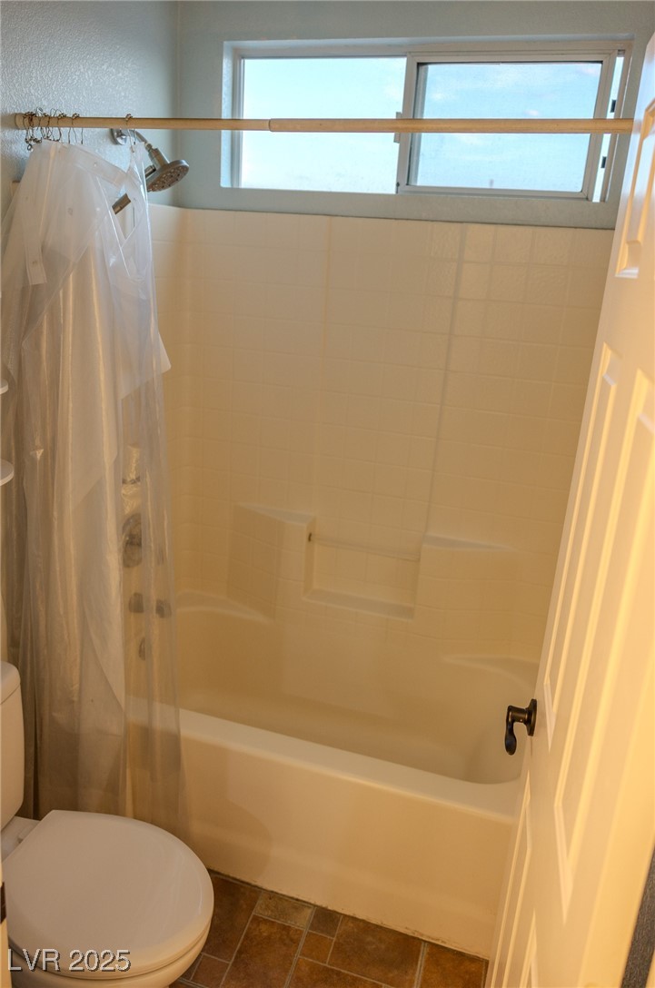 212 Malcolm Street Henderson, NV 89074 - Photo 25 of 47 Upstairs guest. Bathroom with shower / bathtub combination with curtain and toilet