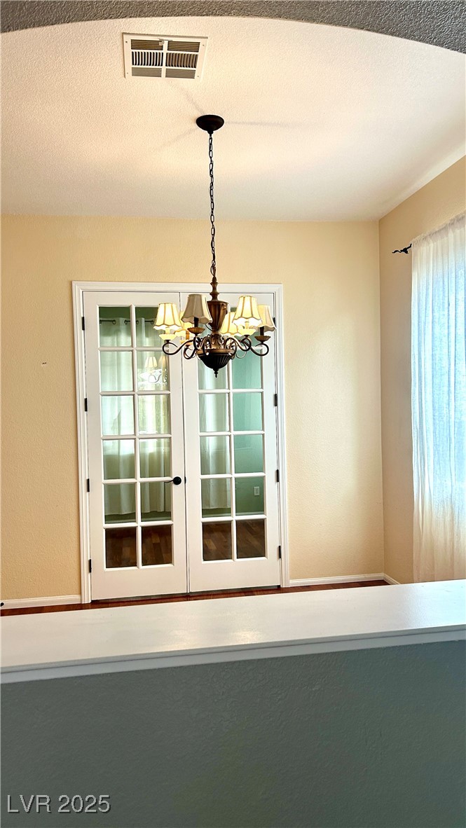 212 Malcolm Street Henderson, NV 89074 - Photo 42 of 47 Detailed view of a chandelier and a textured ceiling