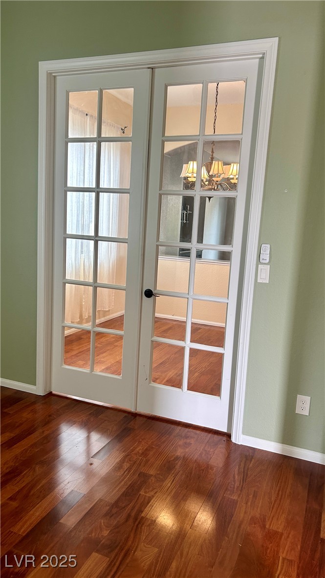 212 Malcolm Street Henderson, NV 89074 - Photo 44 of 47 Added OFFICE with french doors and hardwood / wood-style floors