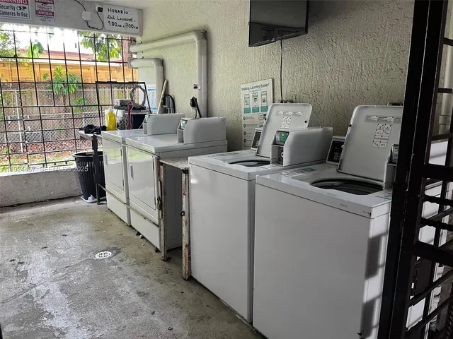a view of kitchen and sink