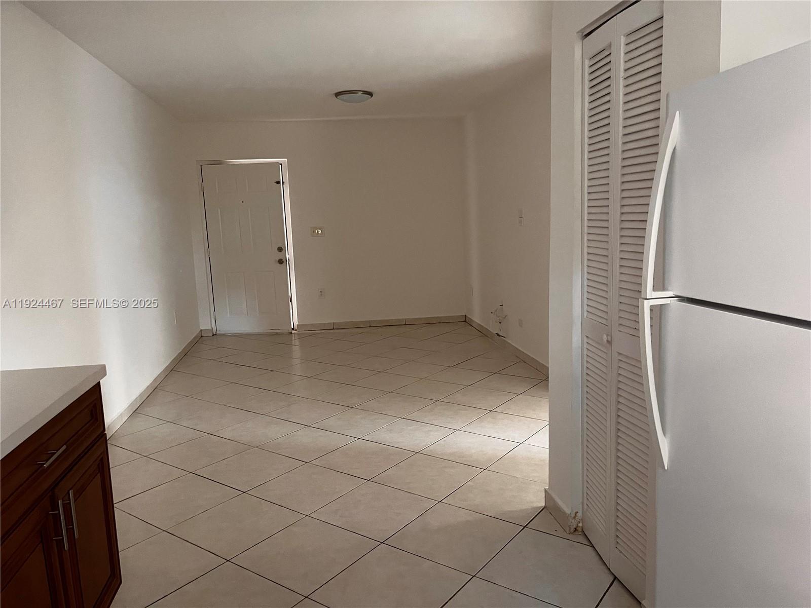 181 Northwest 47th Avenue, Unit 8 Miami, FL 33126 - Photo 7 of 22 a view of an empty room