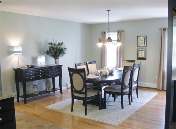 Lot 11-18 Douglas Corner Road Rochester, MA 02770 - Photo 2 of 3 a dining room with furniture potted plants and wooden floor