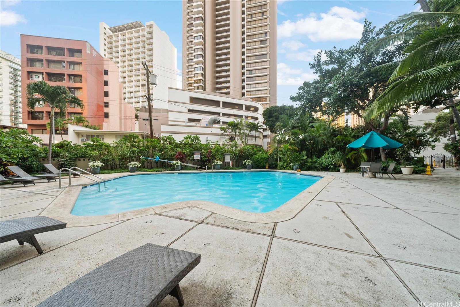 425 Ena Road, Unit B602 Honolulu, HI 96815 - Photo 12 of 16 a view of a city with tall buildings