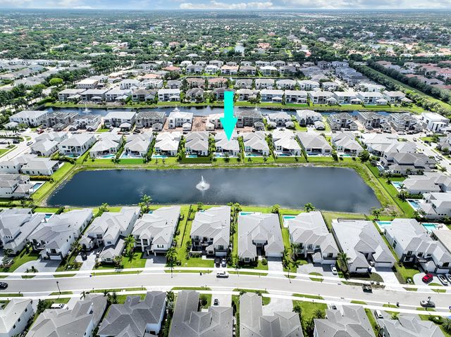 an aerial view of a city with lots of residential buildings