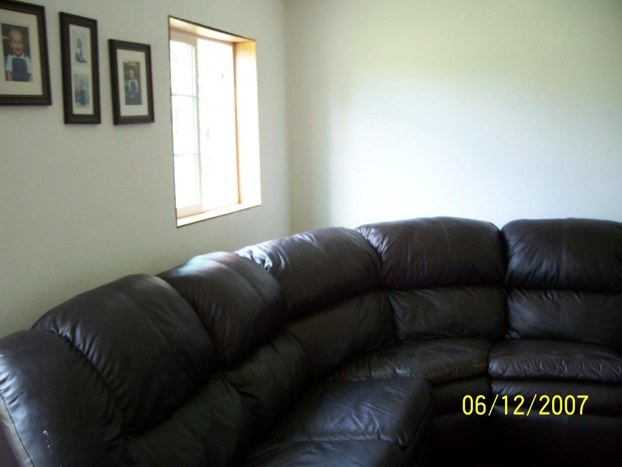 7301 Mieras Road Yakima, WA 98901 - Photo 7 of 12 a living room with furniture and a window