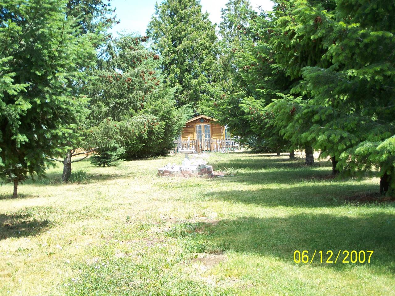 7301 Mieras Road Yakima, WA 98901 - Photo 10 of 12 a view of a house with a yard
