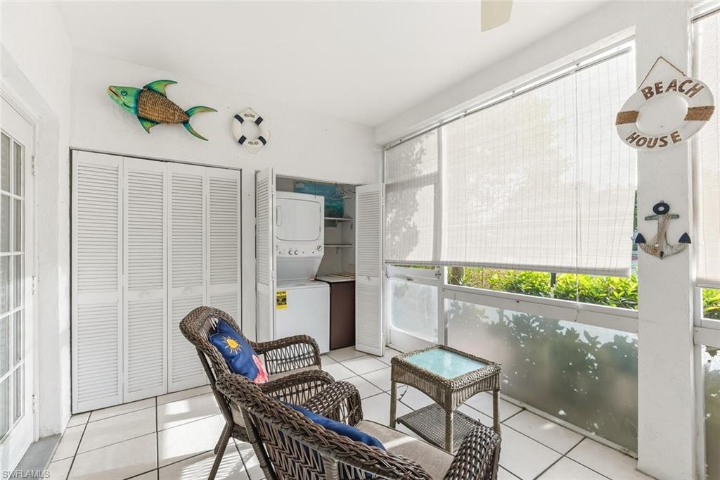 Undisclosed Address Naples, FL 34113 - Photo 11 of 24 a view of a dining room with furniture and a window