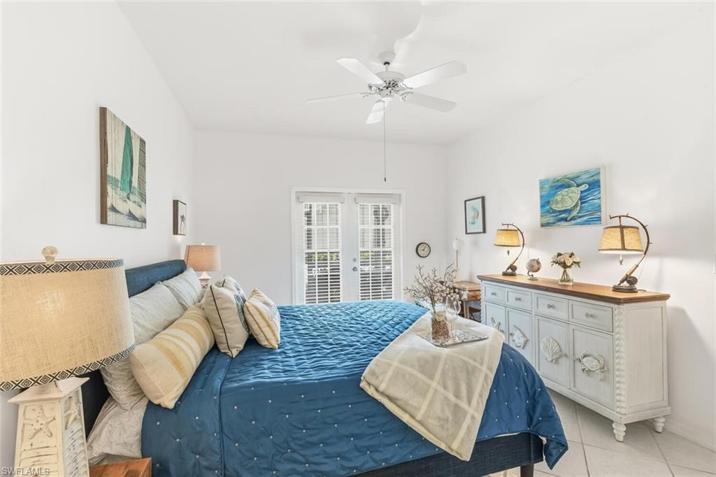 Undisclosed Address Naples, FL 34113 - Photo 14 of 24 a living room with furniture and wooden floor