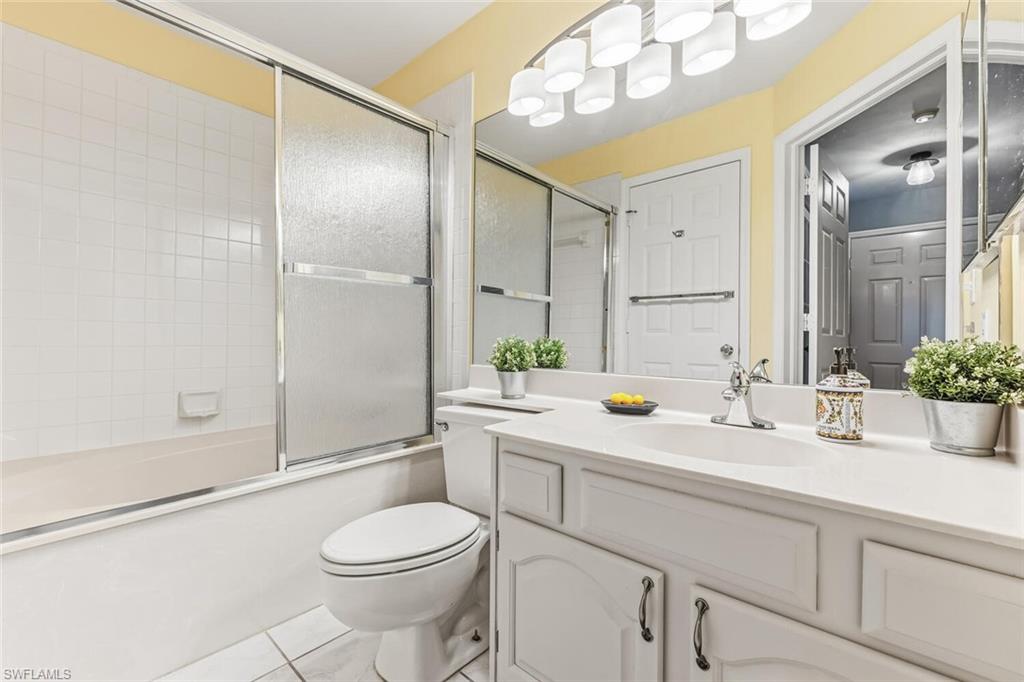 Undisclosed Address Naples, FL 34113 - Photo 17 of 24 a bathroom with a sink a toilet and shower