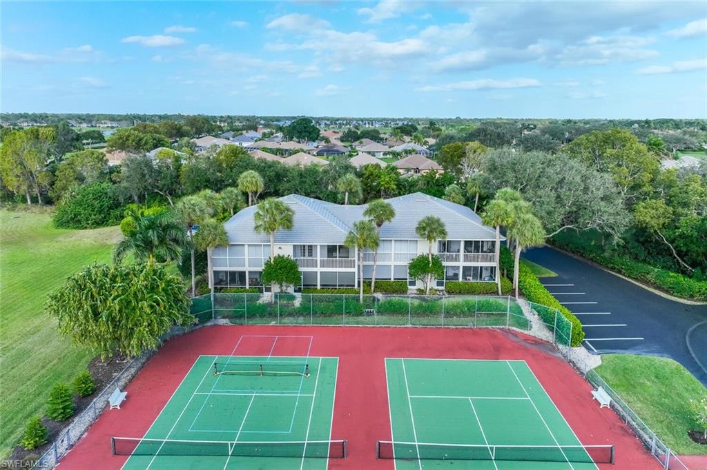 Undisclosed Address Naples, FL 34113 - Photo 18 of 24 a view of yard with swimming pool and outdoor seating