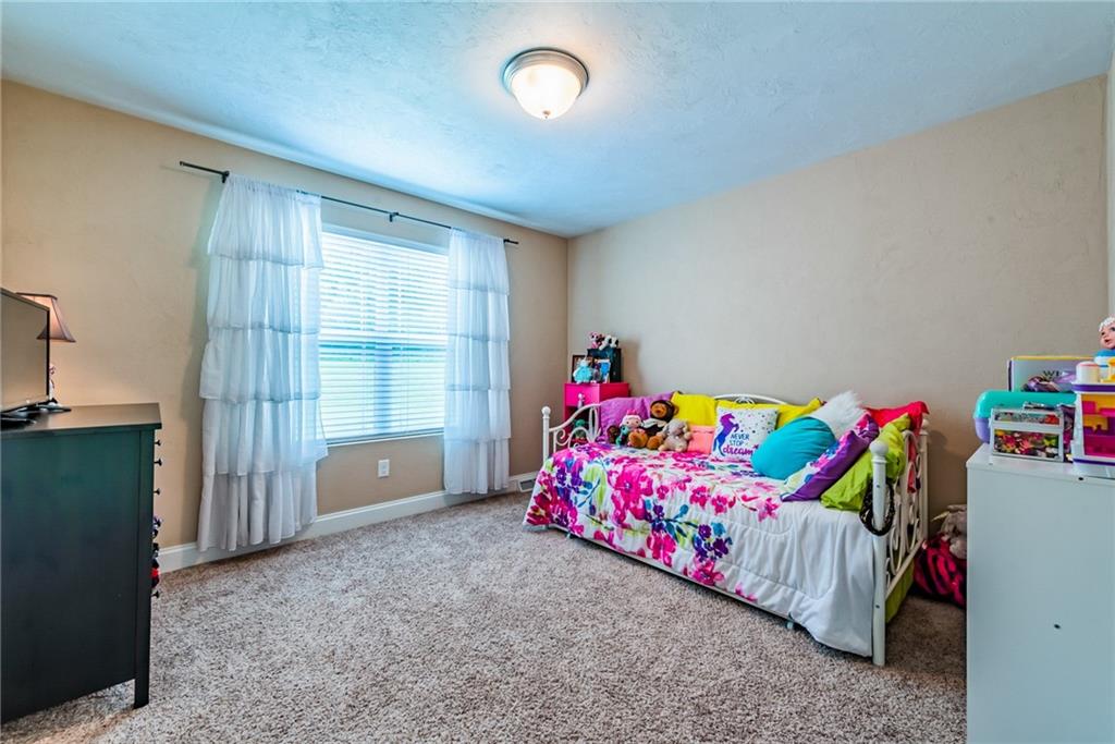 216 Saylor Road Dunbar, PA 15431 - Photo 18 of 25 a room with toys and a wooden floor