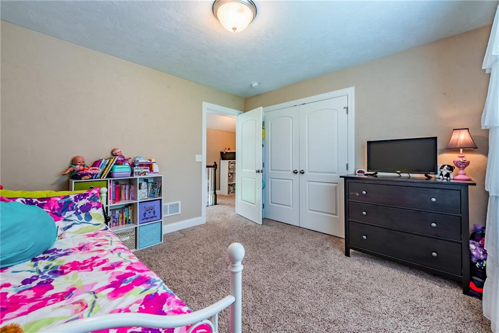 216 Saylor Road Dunbar, PA 15431 - Photo 19 of 25 a bedroom with a bed and a tv