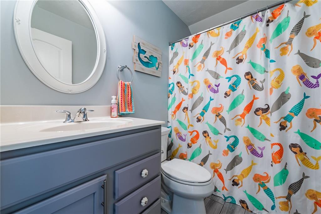 216 Saylor Road Dunbar, PA 15431 - Photo 20 of 25 a bathroom with a sink and a mirror