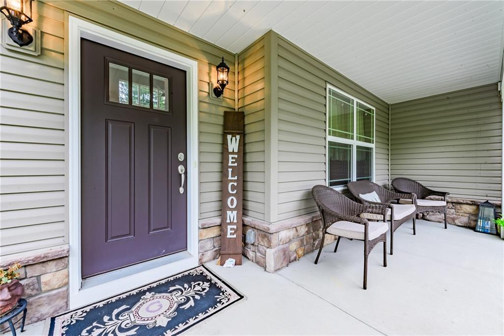 216 Saylor Road Dunbar, PA 15431 - Photo 3 of 25 a backyard of a house with barbeque oven table and chairs