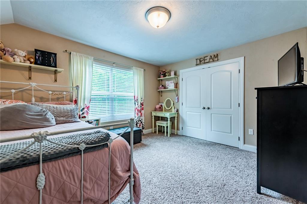 216 Saylor Road Dunbar, PA 15431 - Photo 21 of 25 a bedroom with a bed and a window