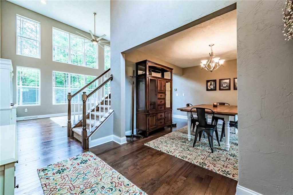216 Saylor Road Dunbar, PA 15431 - Photo 4 of 25 a view of a livingroom kitchen and dinning room with wooden floor