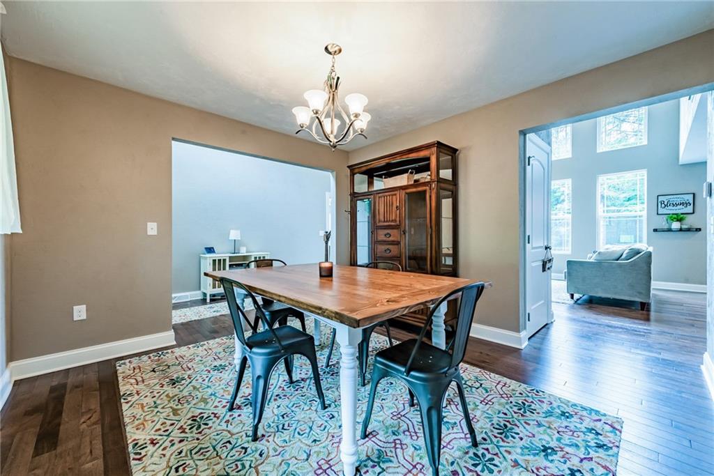 216 Saylor Road Dunbar, PA 15431 - Photo 5 of 25 a view of a dining room with furniture and wooden floor