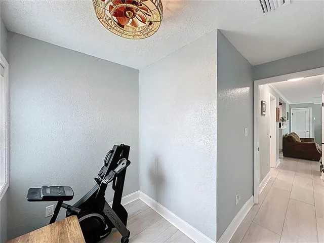 a view of a livingroom with furniture and window