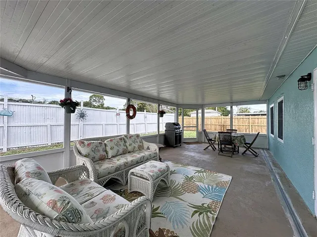 an aerial view of a house with a garden