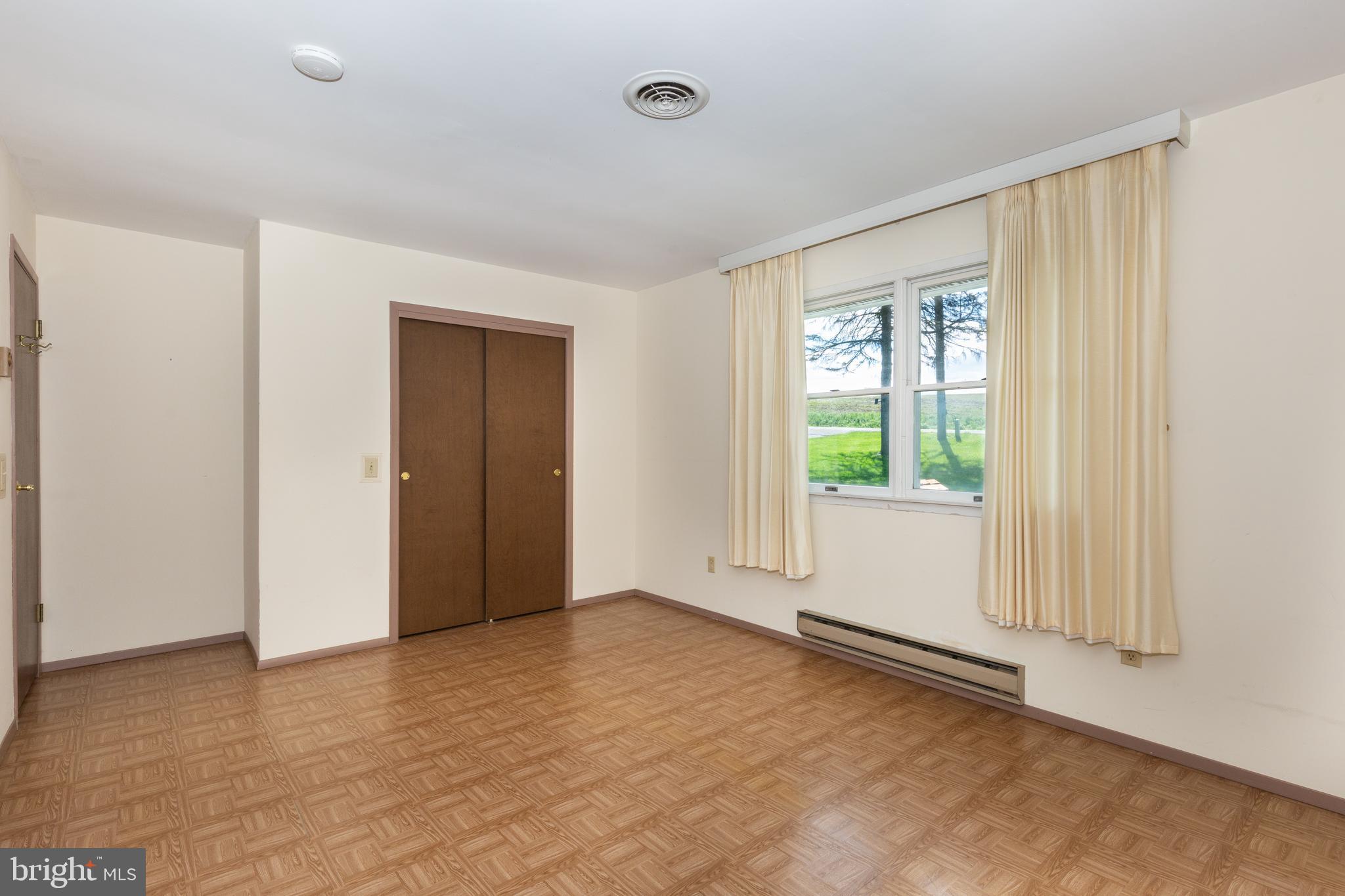 4300 Maple Grove Road Hampstead, MD 21074 - Photo 14 of 58 a view of an empty room with a window