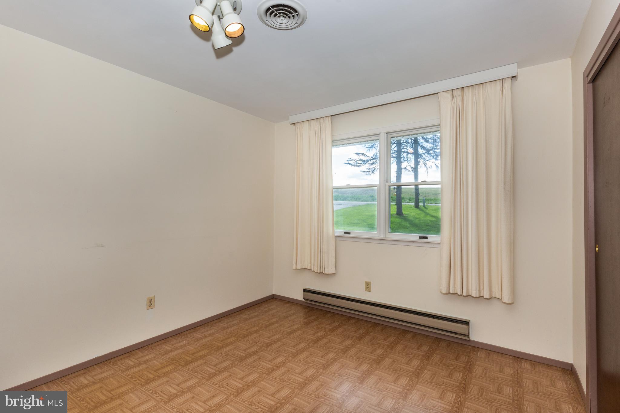 4300 Maple Grove Road Hampstead, MD 21074 - Photo 15 of 58 an empty room with a window