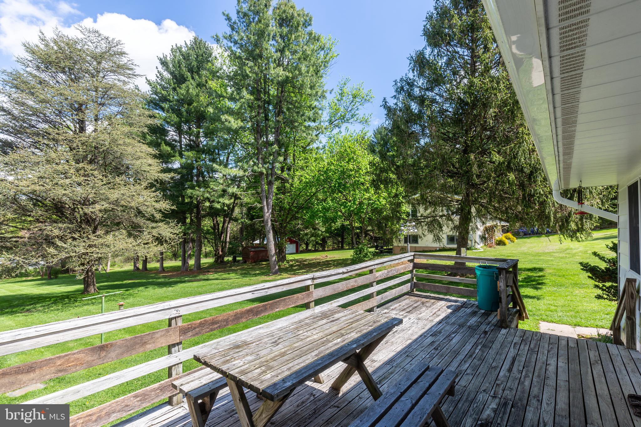 4300 Maple Grove Road Hampstead, MD 21074 - Photo 30 of 58 a view of a wooden deck with a sitting area