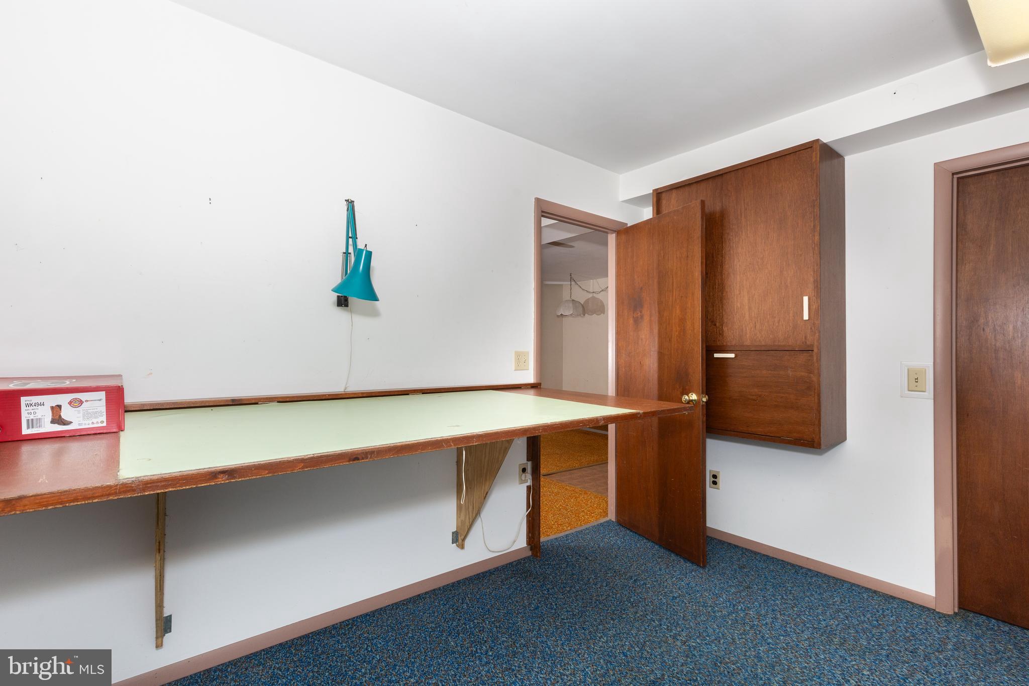 4300 Maple Grove Road Hampstead, MD 21074 - Photo 32 of 58 a room with a table and a potted plant