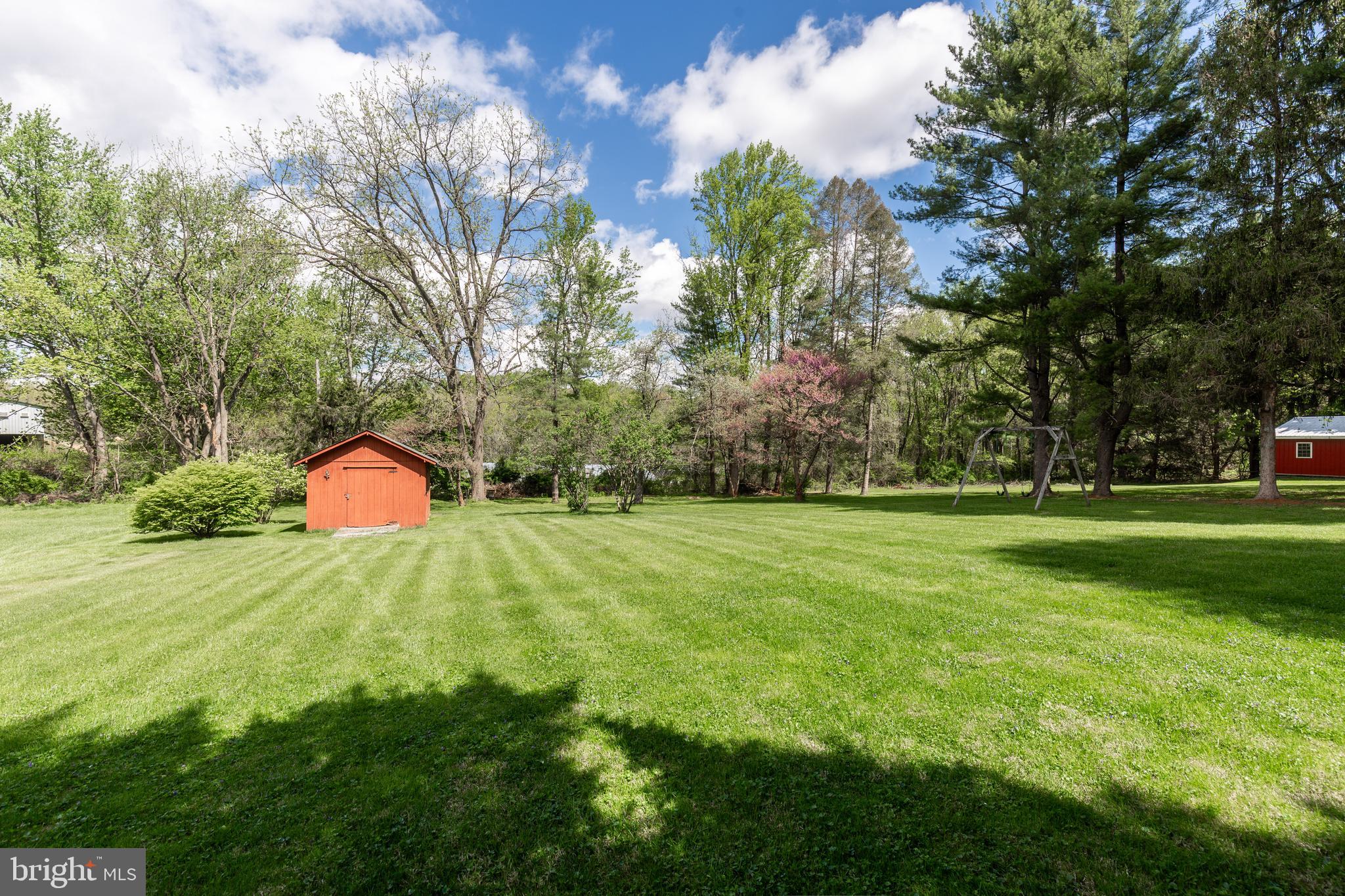 4300 Maple Grove Road Hampstead, MD 21074 - Photo 44 of 58 a backyard of a house with lots of green space