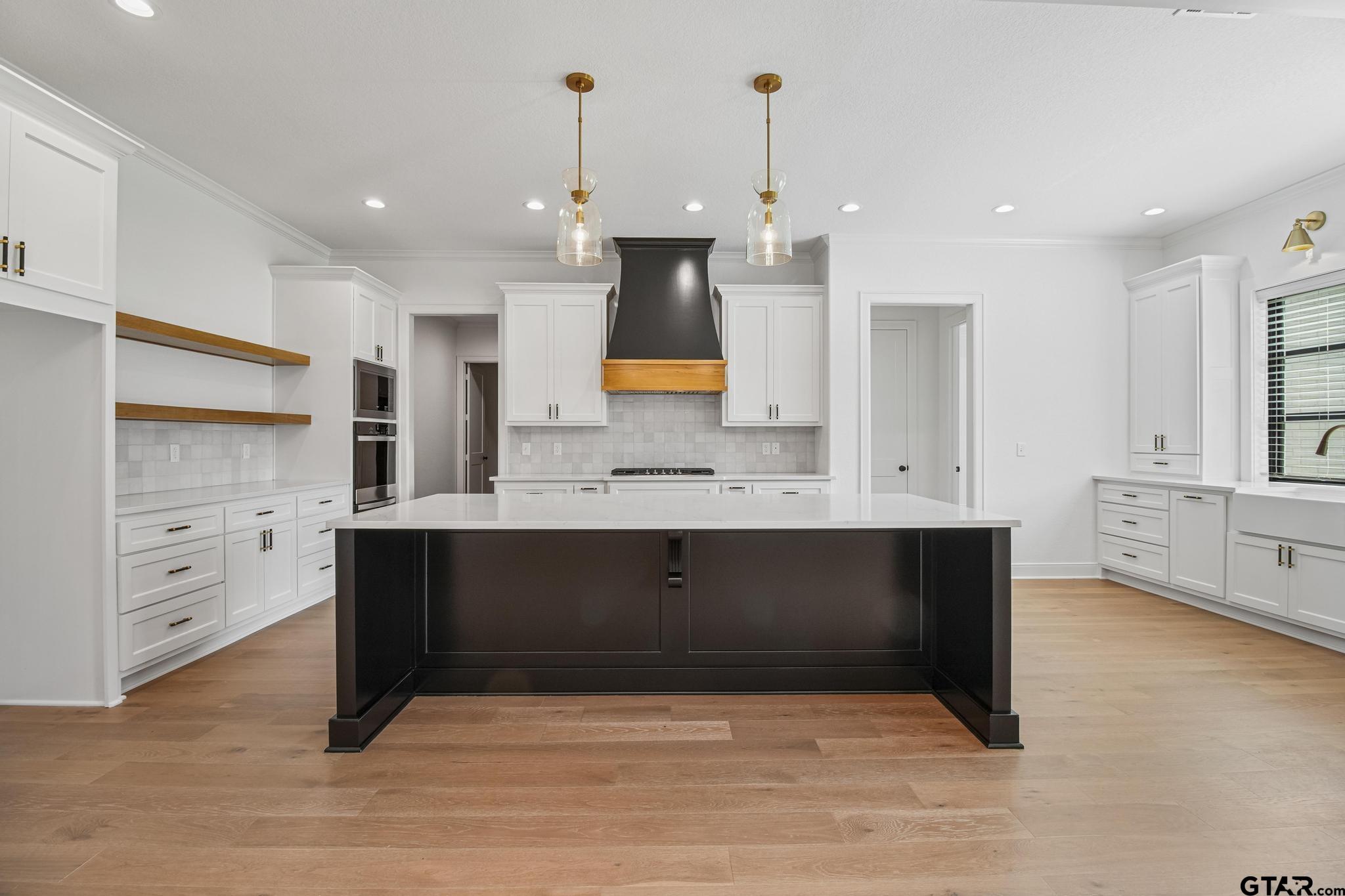 16511 Cooper Way Flint, TX 75762 - Photo 12 of 44 a view with cabinets and window