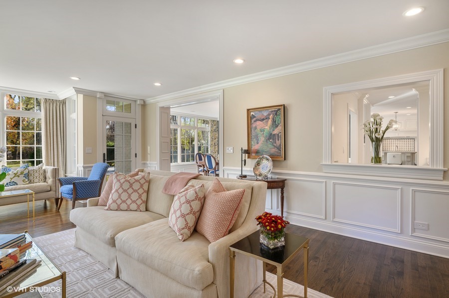 29 Woodley Road Winnetka, IL 60093 - Photo 11 of 65 a living room with furniture and a large window