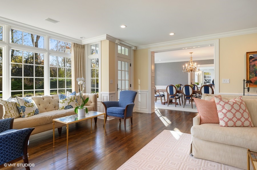 29 Woodley Road Winnetka, IL 60093 - Photo 14 of 65 a living room with furniture and floor to ceiling windows