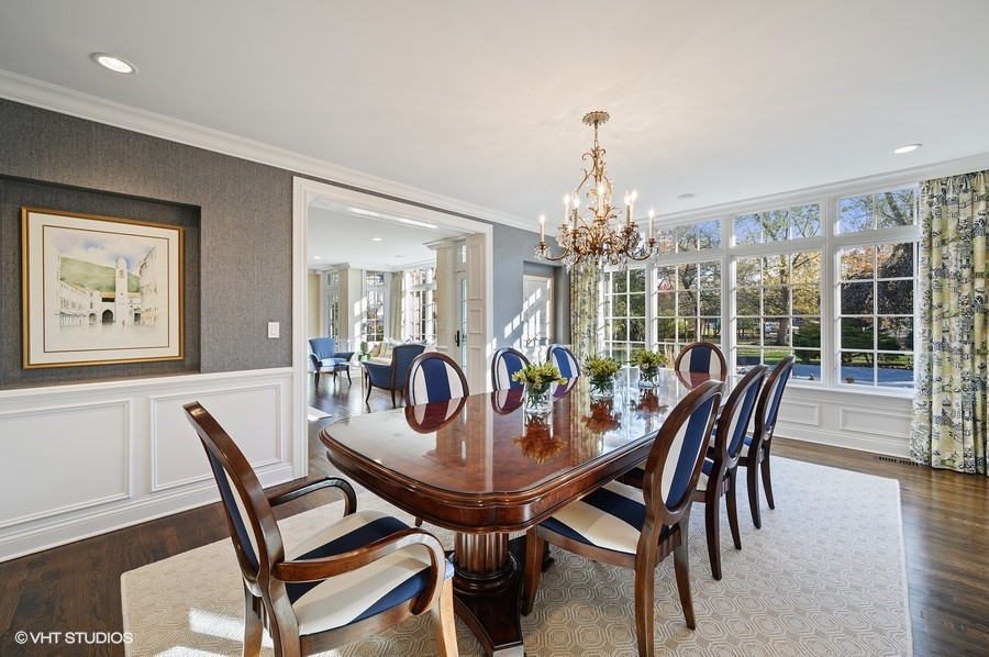 29 Woodley Road Winnetka, IL 60093 - Photo 16 of 65 a view of a dining room with furniture window and wooden floor