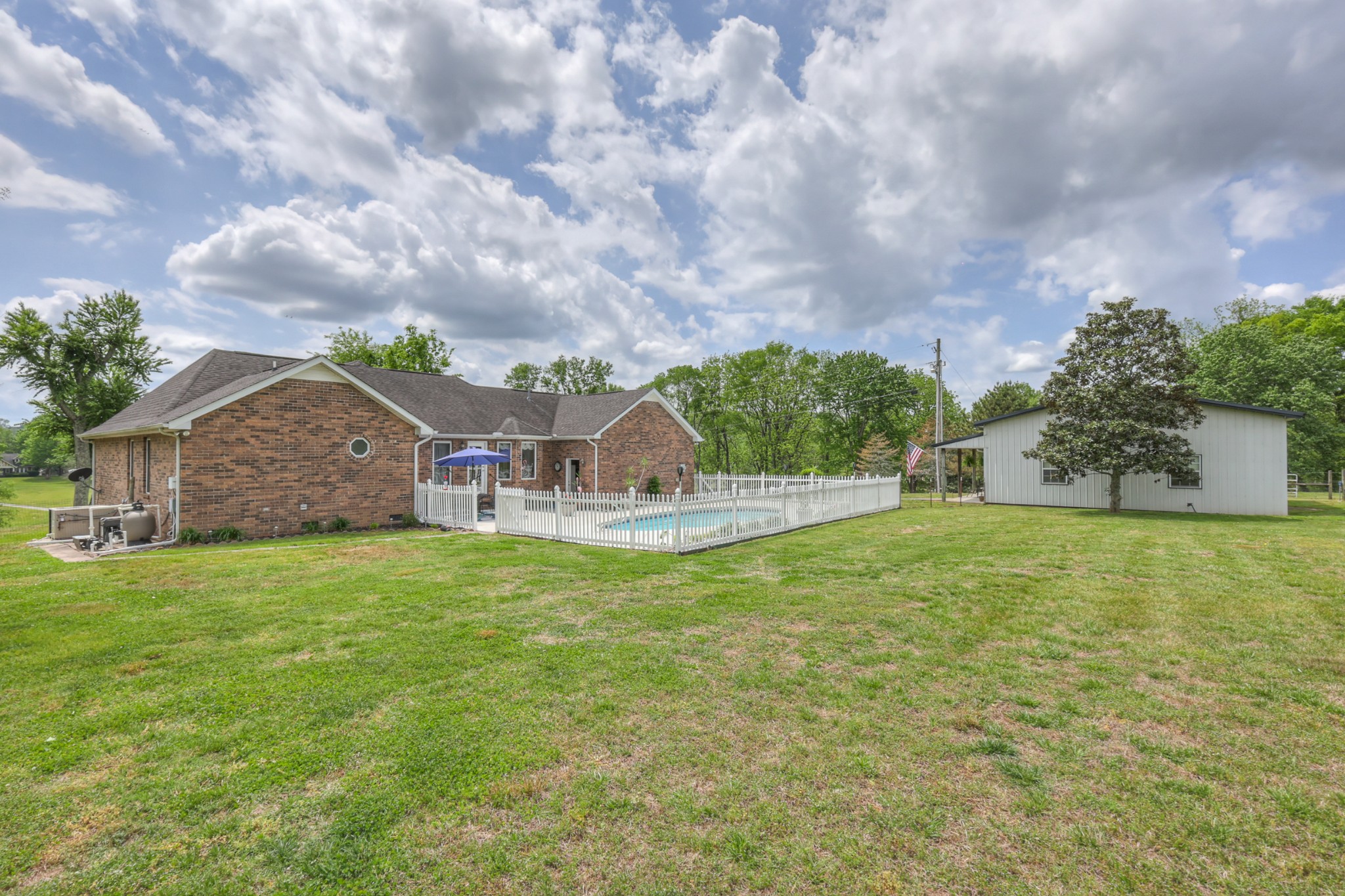 590 Allisona Road Eagleville, TN 37060 - Photo 7 of 55 a view of a house with a big yard and a large tree