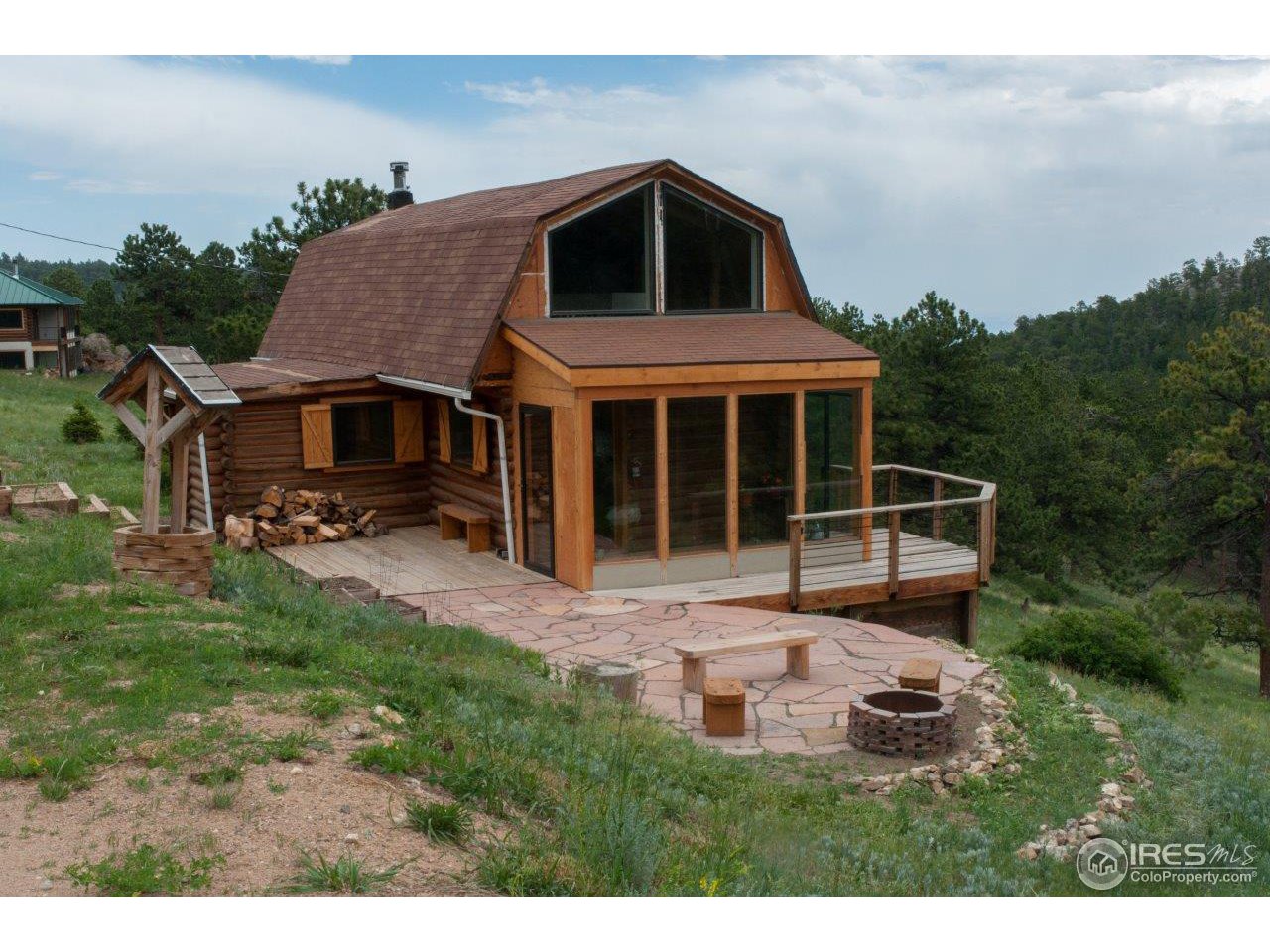 229 Jed Smith Road Ward, CO 80481 - Photo 20 of 20 a front view of a house with a yard