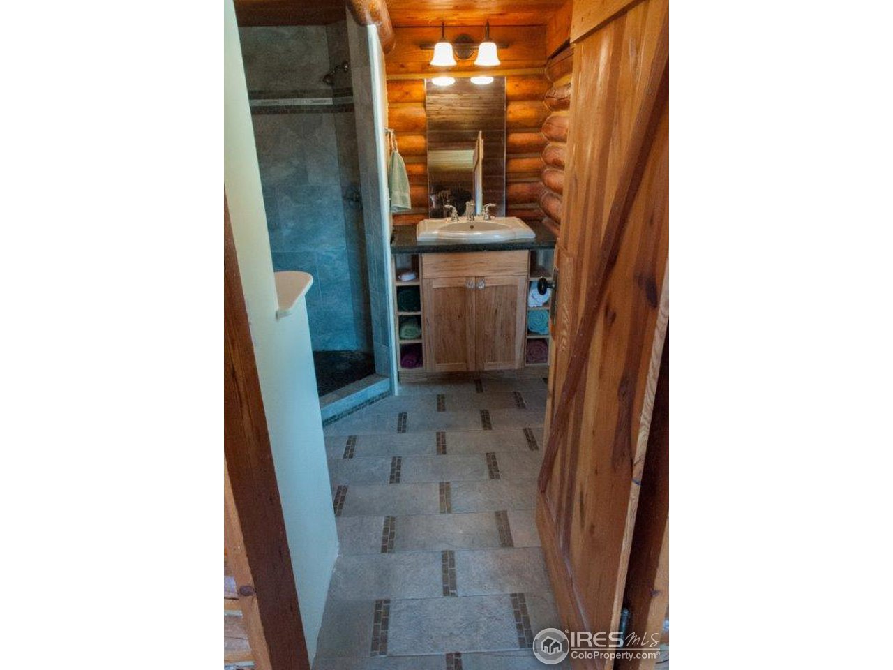 229 Jed Smith Road Ward, CO 80481 - Photo 8 of 20 a bathroom with a sink and a shower