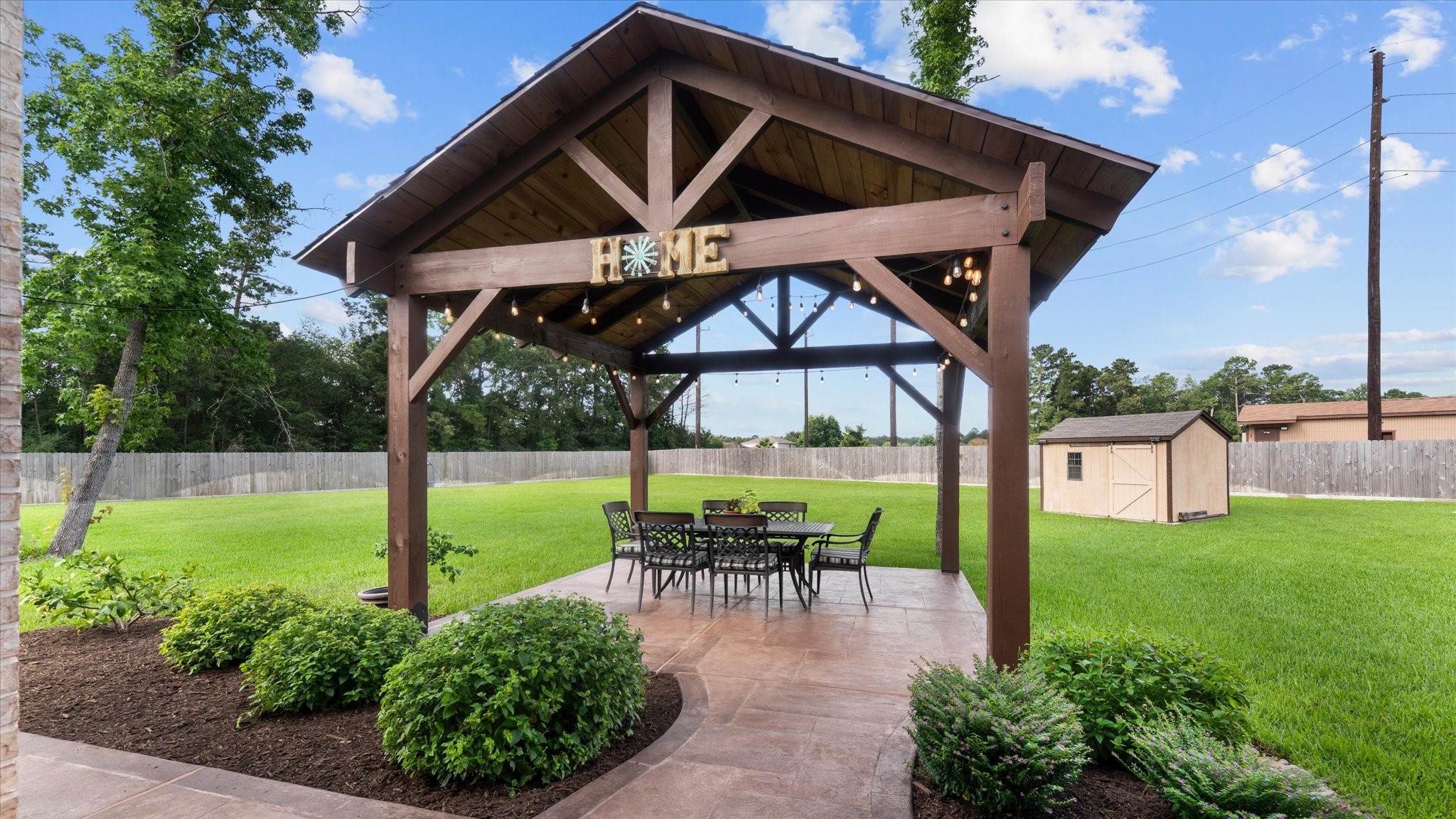 32001 Birch Briar Court Spring, TX 77386 - Photo 42 of 48 Custom outdoor pavilion creates the perfect gathering space for grilling, dining, and relaxing while enjoying the spacious backyard.