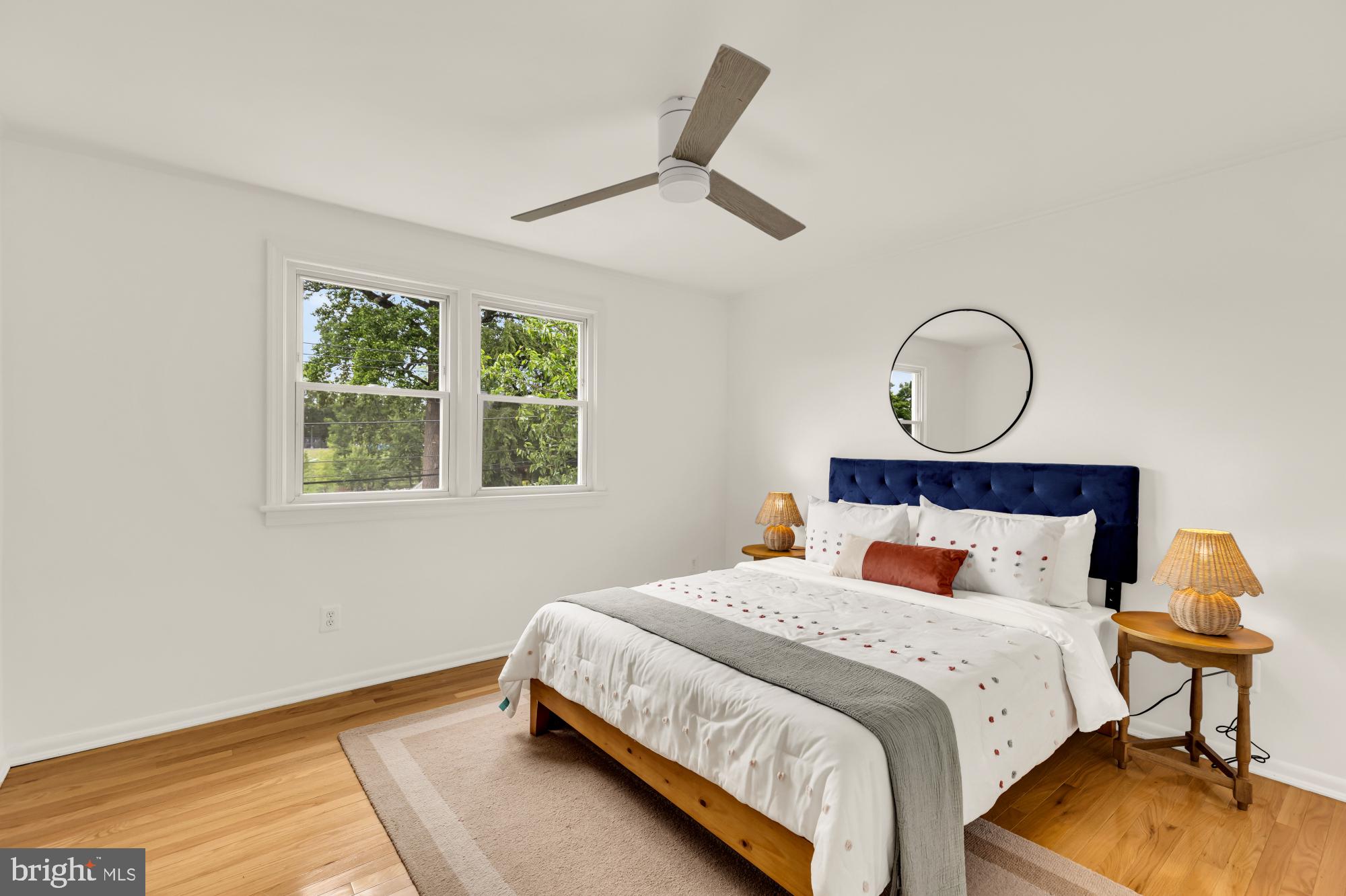 2030 Luzerne Avenue Silver Spring, MD 20910 - Photo 14 of 25 a bedroom with bed and a window