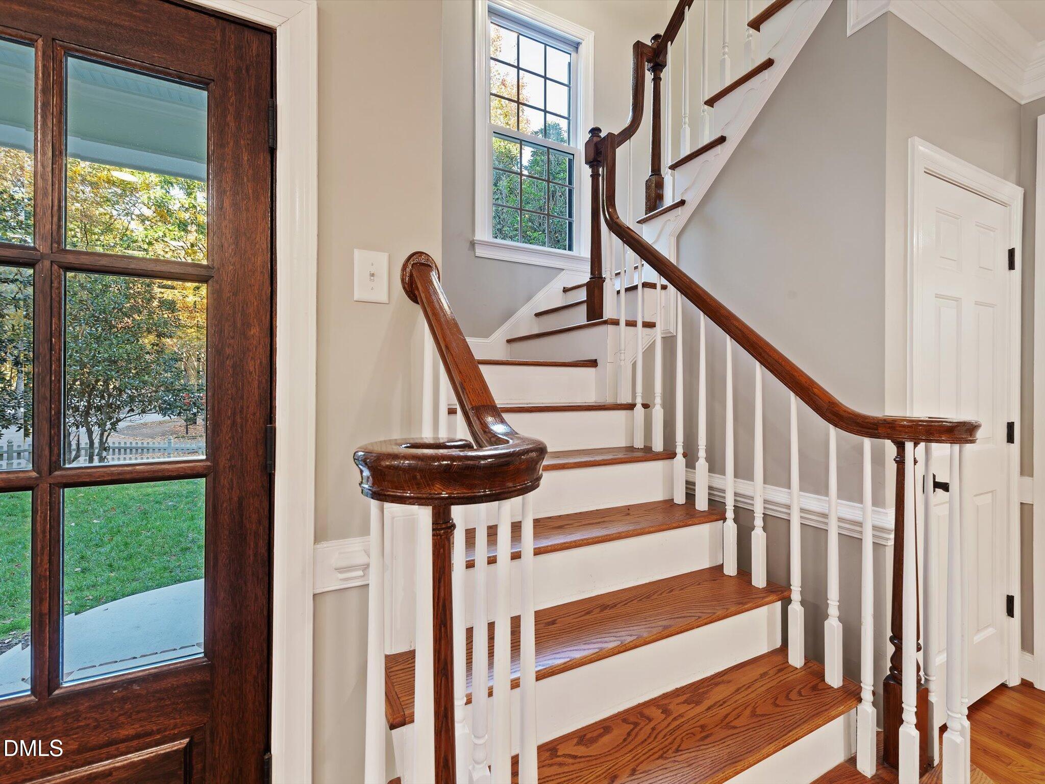 4201 Falls River Avenue Raleigh, NC 27614 - Photo 17 of 52 a view of entryway with wooden floor and windows