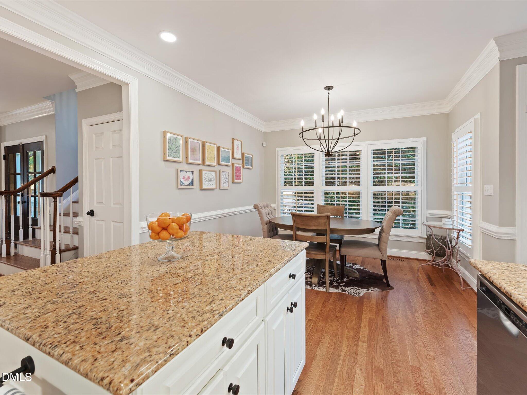 4201 Falls River Avenue Raleigh, NC 27614 - Photo 18 of 52 a view of a dining room with furniture window and outside view