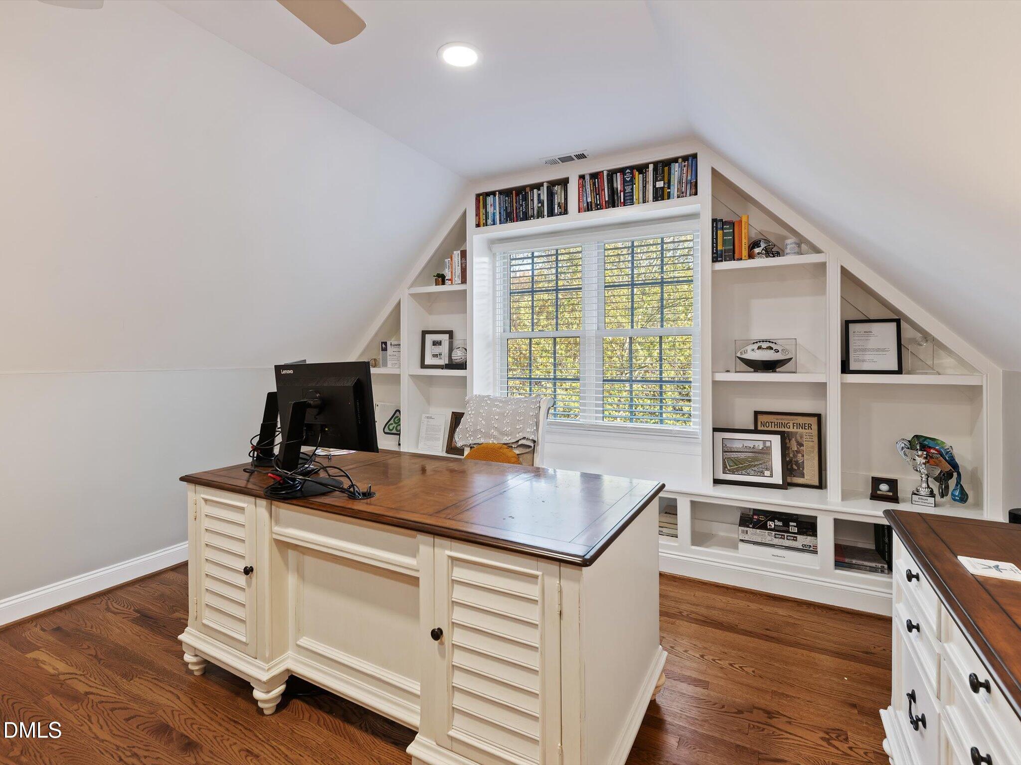 4201 Falls River Avenue Raleigh, NC 27614 - Photo 26 of 52 a kitchen that has a microwave a stove and a sink