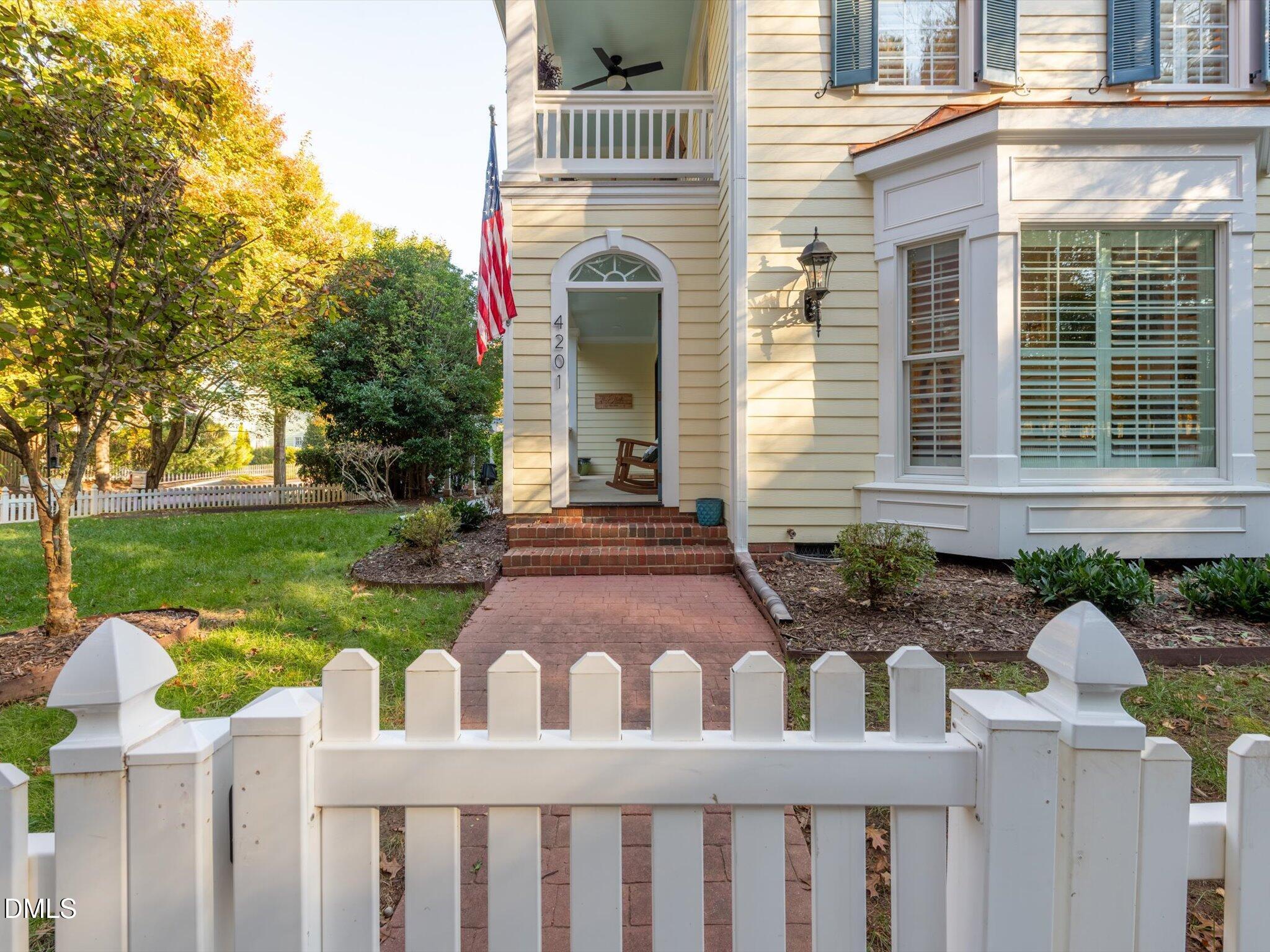 4201 Falls River Avenue Raleigh, NC 27614 - Photo 3 of 52 a front view of a house with garden