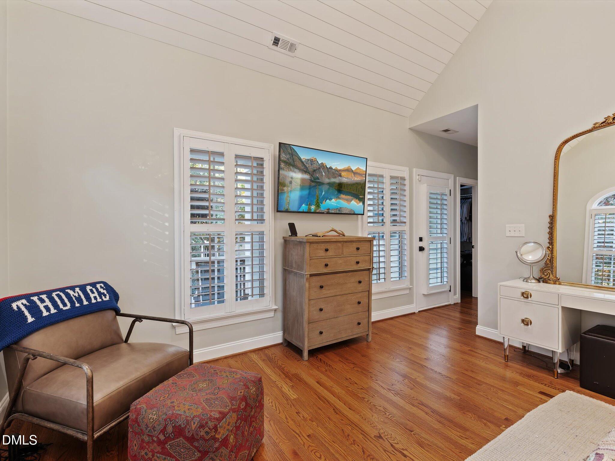 4201 Falls River Avenue Raleigh, NC 27614 - Photo 36 of 52 a bedroom with furniture and a window