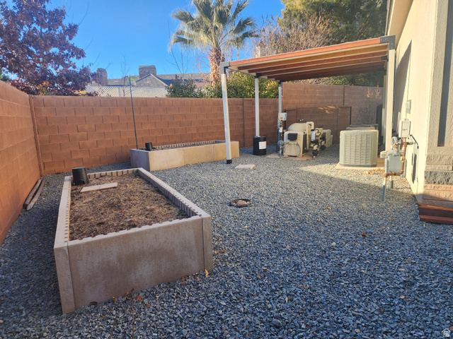 1283 North Gallen Road Santa Clara, UT 84765 - Photo 62 of 103 Fenced backyard featuring a vegetable garden