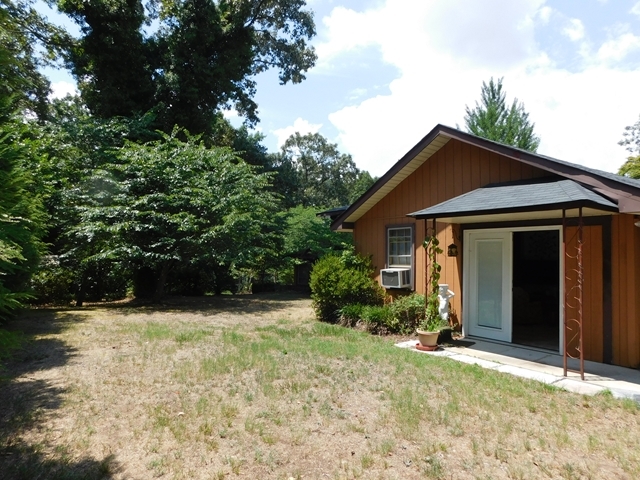 303 Pinecrest Road Warner Robins, GA 31093 - Photo 3 of 6 a front view of a house with a yard