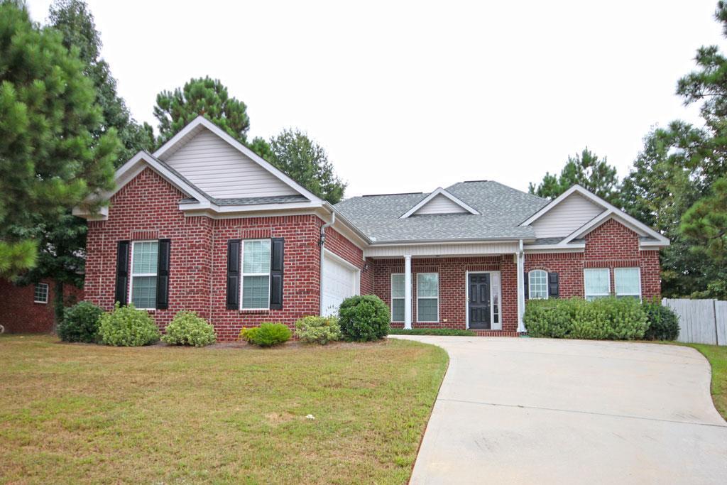 216 Timber Ridge Boulevard Byron, GA 31008 - Photo 1 of 1 a front view of a house with garden