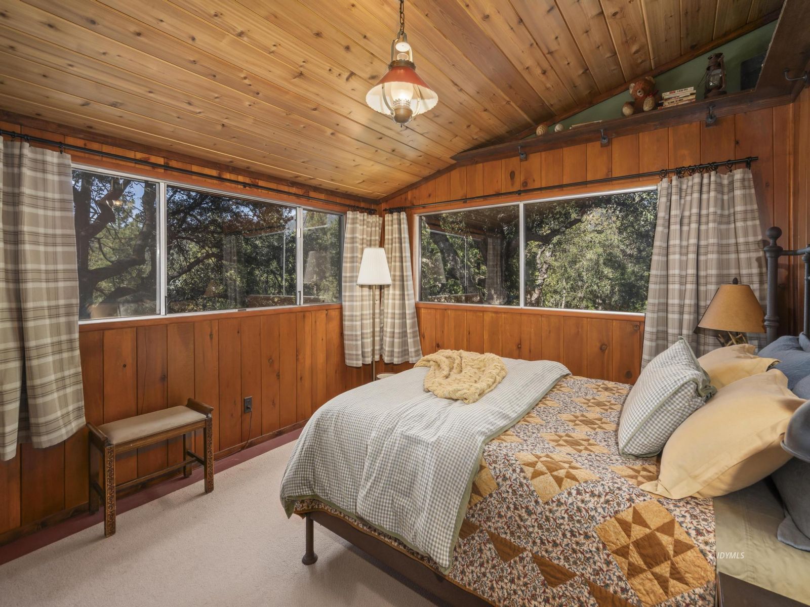 53241 Middleridge Drive Idyllwild, CA 92549 - Photo 28 of 48 a bedroom with a bed and a large window